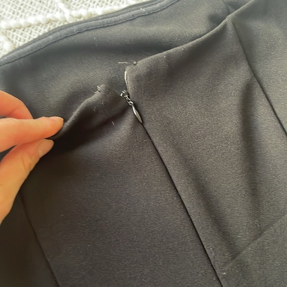 Black jumpsuit 
Hold up the chest with stopper - Picture 5 of 5